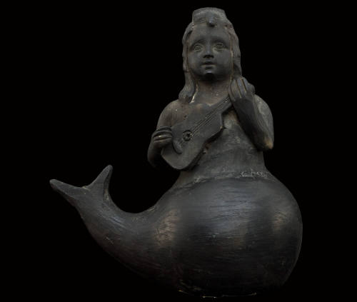 Sirena tocando la guitarra