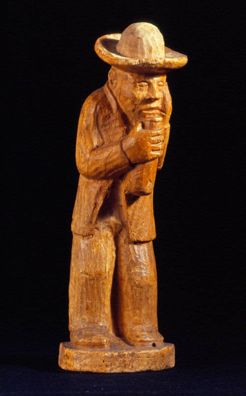 Retrato de Paco Iturbe con botella