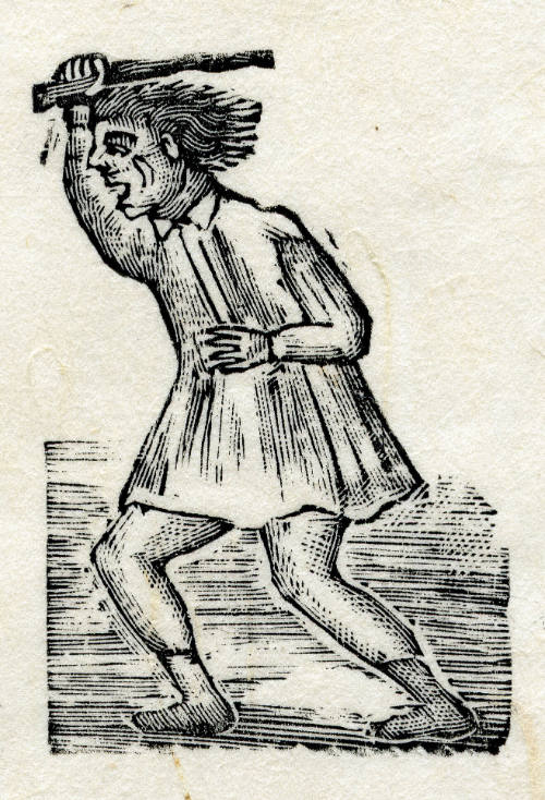 Niño pegando con palo