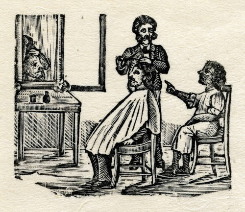 Peluquero cortando pelo